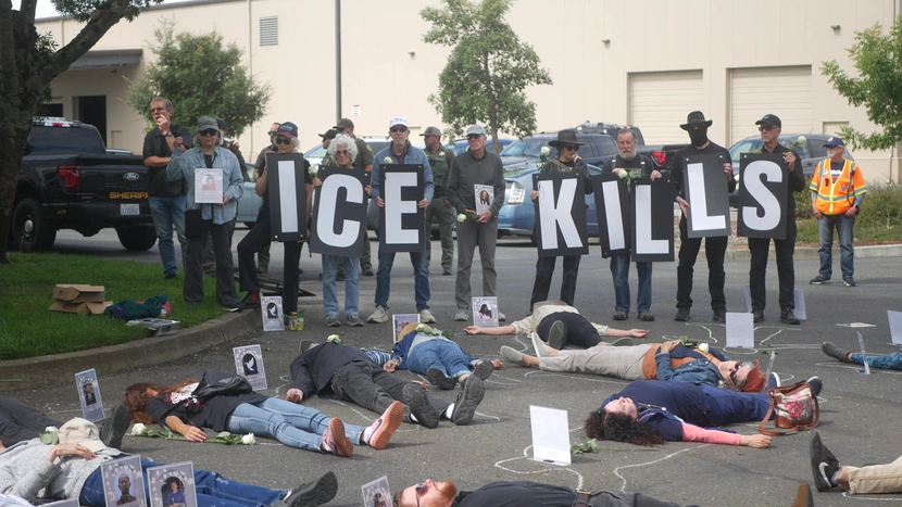 Sonoma county residents stage a die-in outside the Farm Bureau Offices protesting the organization's stance on ICE